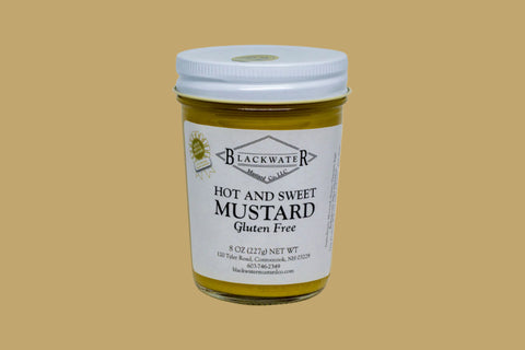 A jar of gluten free hot & sweet mustard.