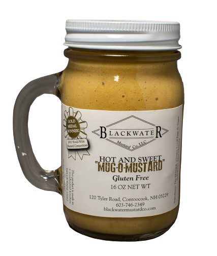 A mug of hot & sweet mustard.